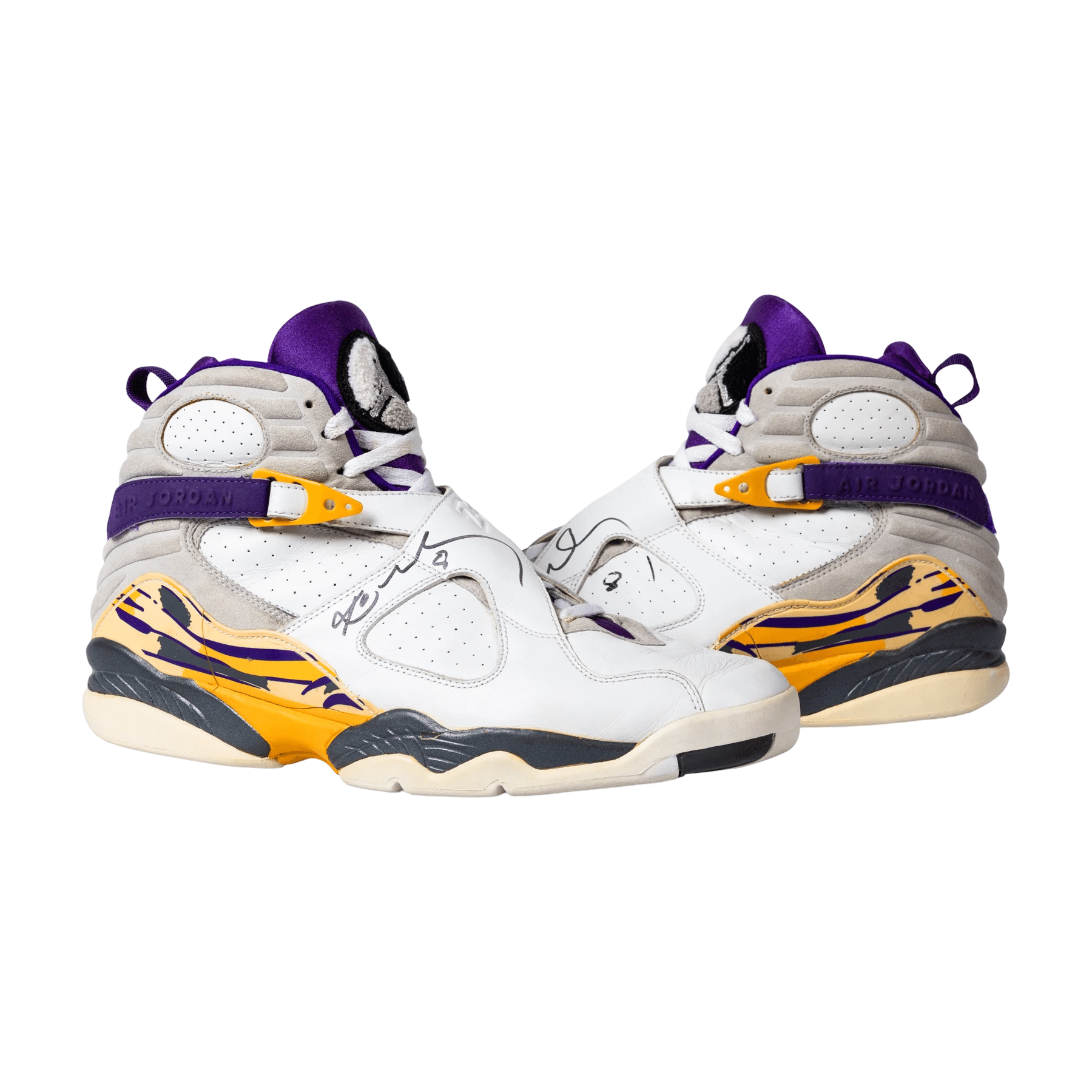 Both signed shoes in profile